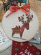 Handmade reindeer embroidered hoop/wall decor